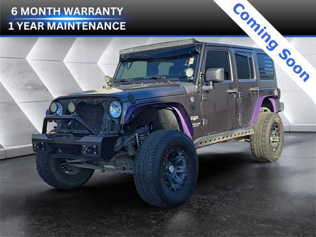 used 2016 Jeep Wrangler Unlimited car, priced at $18,972