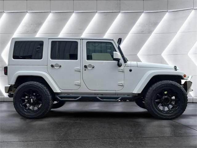 used 2015 Jeep Wrangler Unlimited car, priced at $24,972