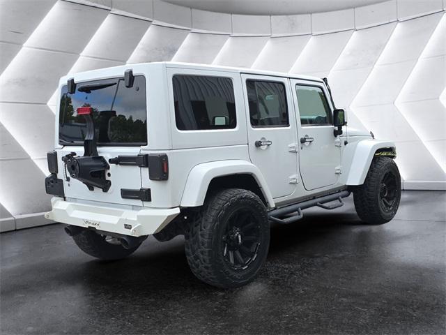 used 2015 Jeep Wrangler Unlimited car, priced at $24,972