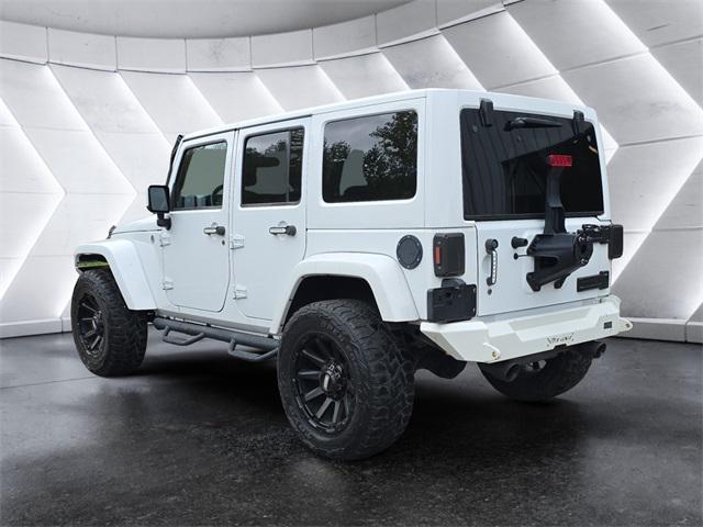 used 2015 Jeep Wrangler Unlimited car, priced at $24,972