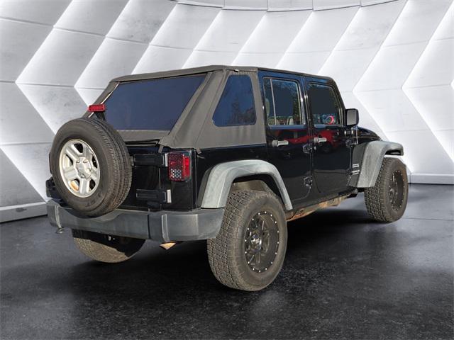 used 2012 Jeep Wrangler Unlimited car, priced at $16,972