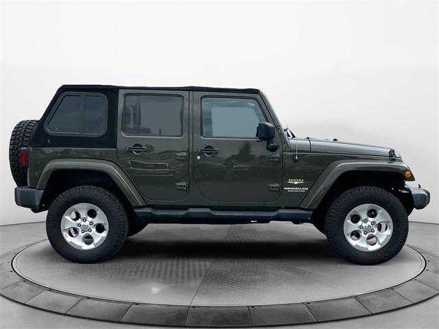 used 2015 Jeep Wrangler Unlimited car, priced at $17,672