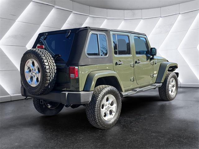 used 2015 Jeep Wrangler Unlimited car, priced at $16,472