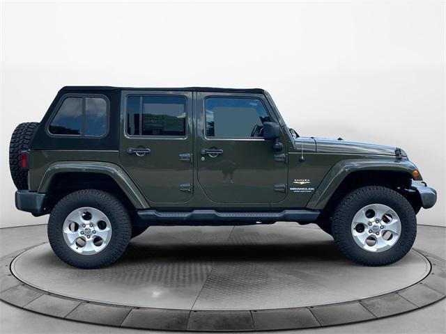 used 2015 Jeep Wrangler Unlimited car, priced at $17,872