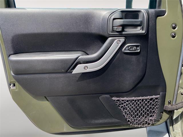 used 2015 Jeep Wrangler Unlimited car, priced at $17,872