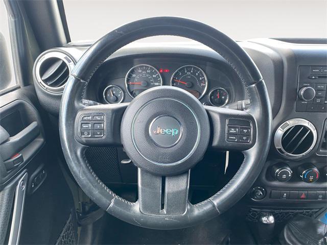 used 2015 Jeep Wrangler Unlimited car, priced at $17,872