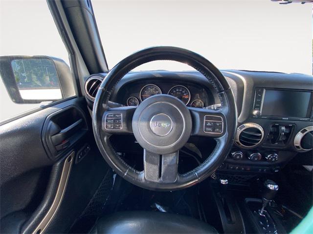 used 2016 Jeep Wrangler Unlimited car, priced at $27,972