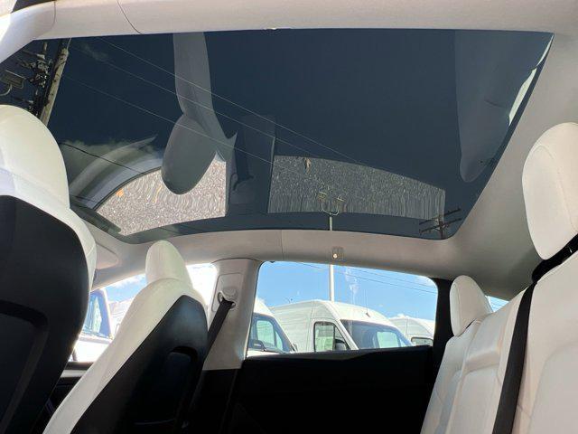 used 2024 Tesla Model Y car, priced at $36,000