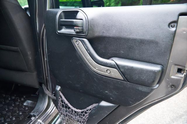 used 2016 Jeep Wrangler Unlimited car, priced at $13,995