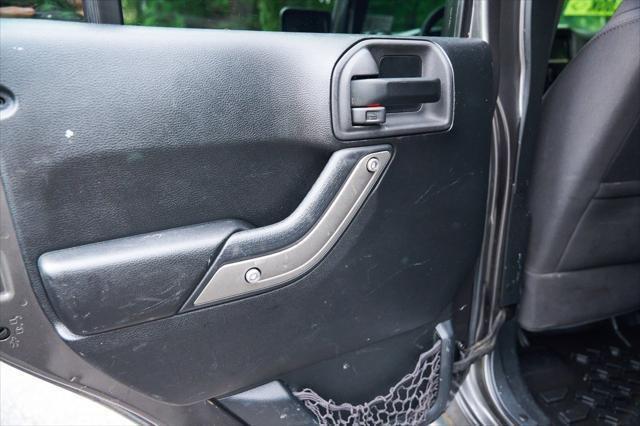 used 2016 Jeep Wrangler Unlimited car, priced at $13,995