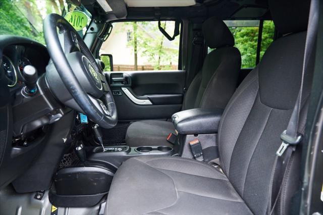 used 2016 Jeep Wrangler Unlimited car, priced at $13,995