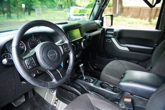used 2016 Jeep Wrangler Unlimited car, priced at $13,995