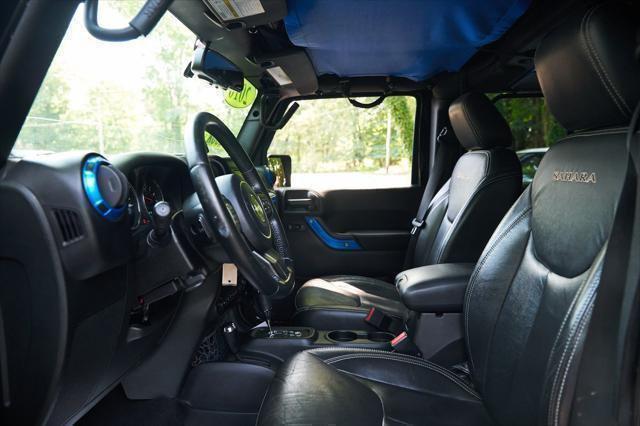 used 2016 Jeep Wrangler Unlimited car, priced at $13,495