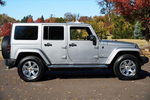 used 2016 Jeep Wrangler Unlimited car, priced at $13,995