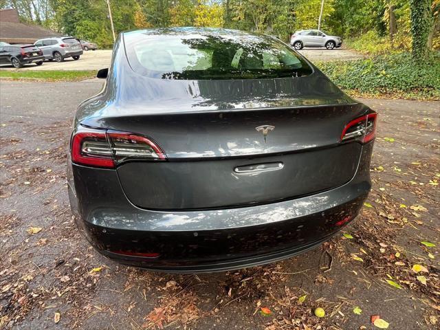 used 2022 Tesla Model 3 car, priced at $13,995