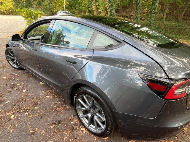 used 2022 Tesla Model 3 car, priced at $13,995