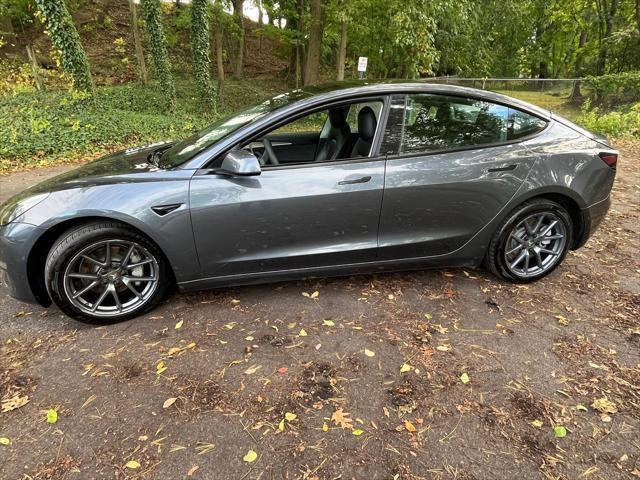 used 2022 Tesla Model 3 car, priced at $13,995