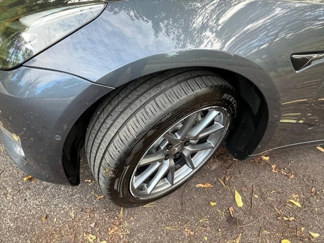 used 2022 Tesla Model 3 car, priced at $13,995