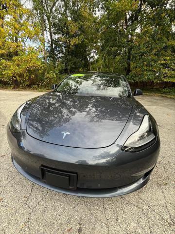 used 2022 Tesla Model 3 car, priced at $13,995