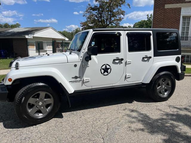 used 2013 Jeep Wrangler Unlimited car, priced at $13,995