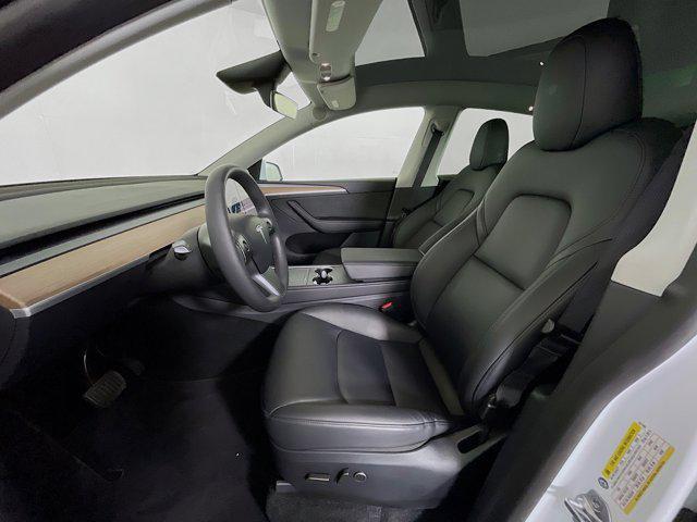 used 2025 Tesla Model Y car, priced at $33,997