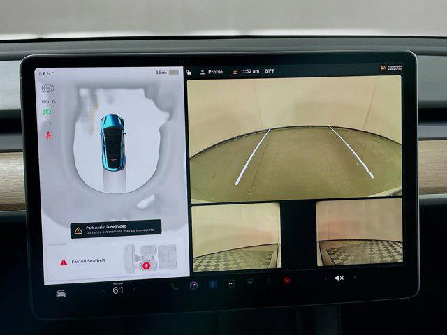 used 2025 Tesla Model Y car, priced at $33,997