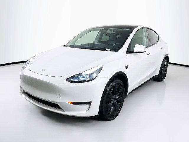 used 2025 Tesla Model Y car, priced at $33,997