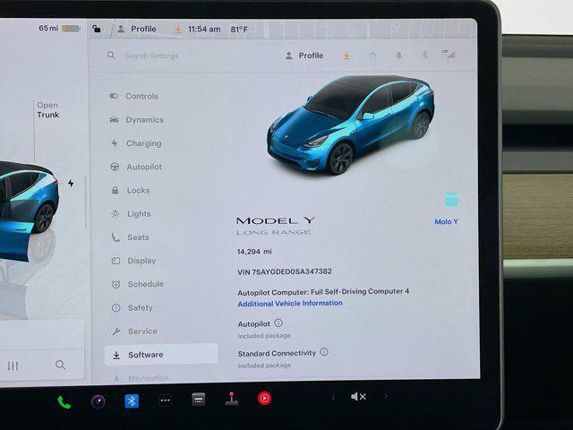 used 2025 Tesla Model Y car, priced at $33,997