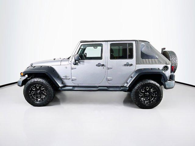 used 2014 Jeep Wrangler Unlimited car, priced at $19,699