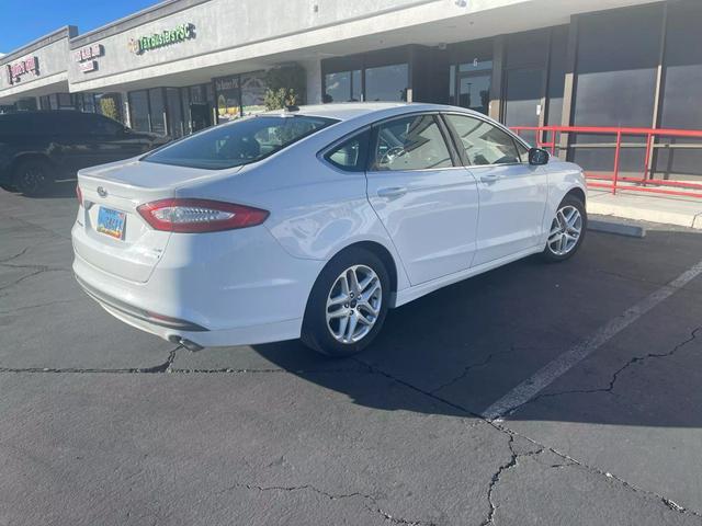 used 2014 Ford Fusion car, priced at $7,400