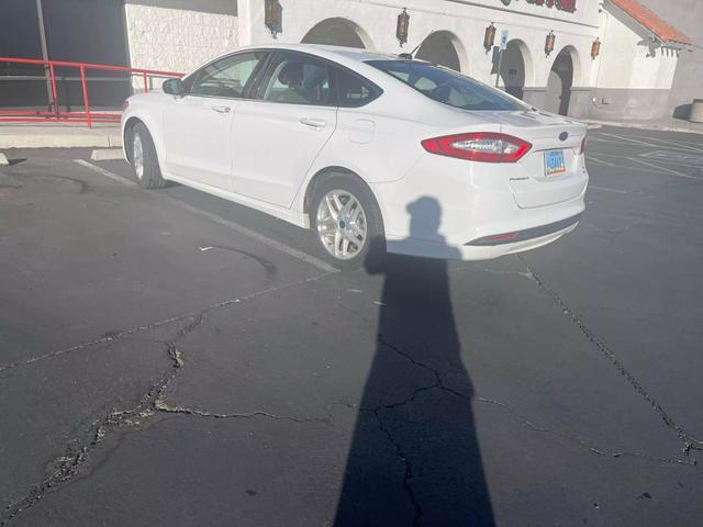 used 2014 Ford Fusion car, priced at $7,400