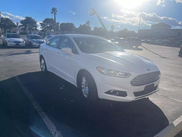 used 2014 Ford Fusion car, priced at $7,400