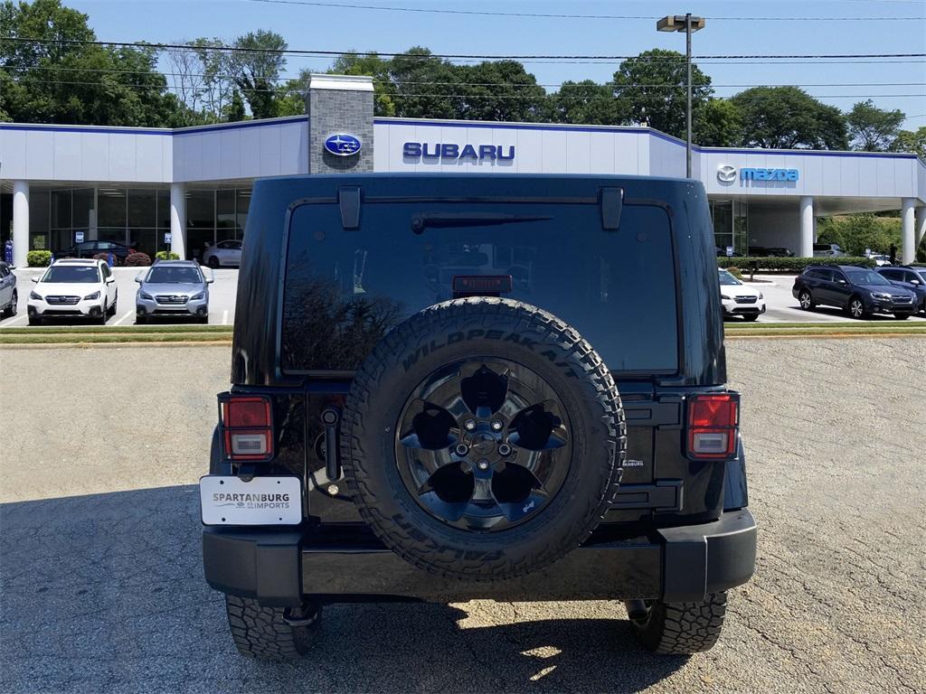 used 2015 Jeep Wrangler car, priced at $17,998