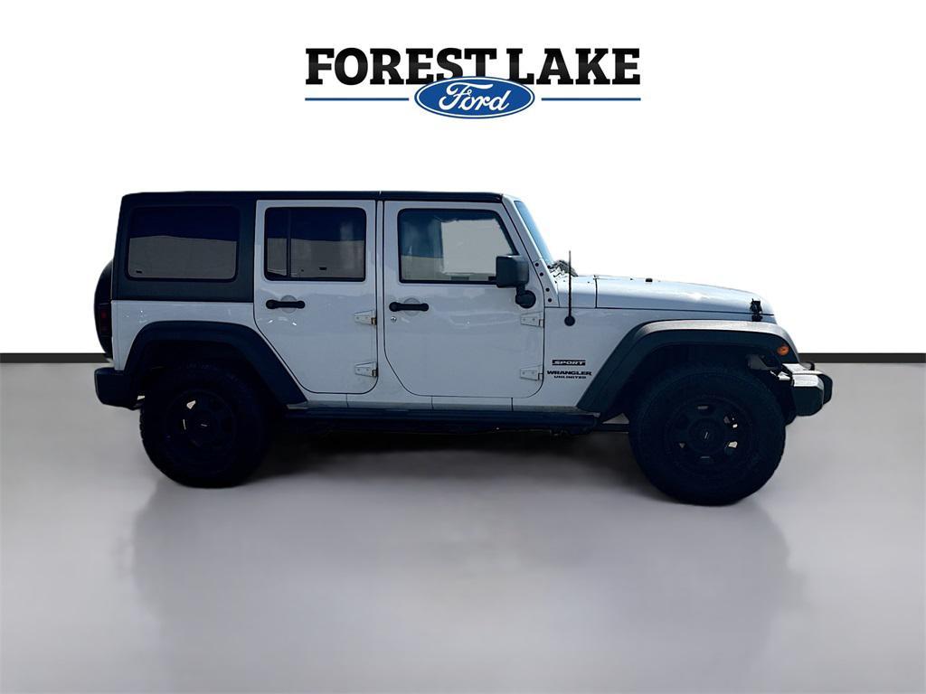 used 2015 Jeep Wrangler Unlimited car, priced at $15,899