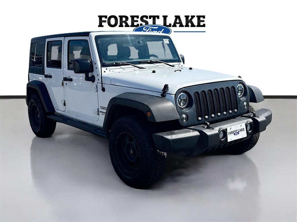 used 2015 Jeep Wrangler Unlimited car, priced at $15,899