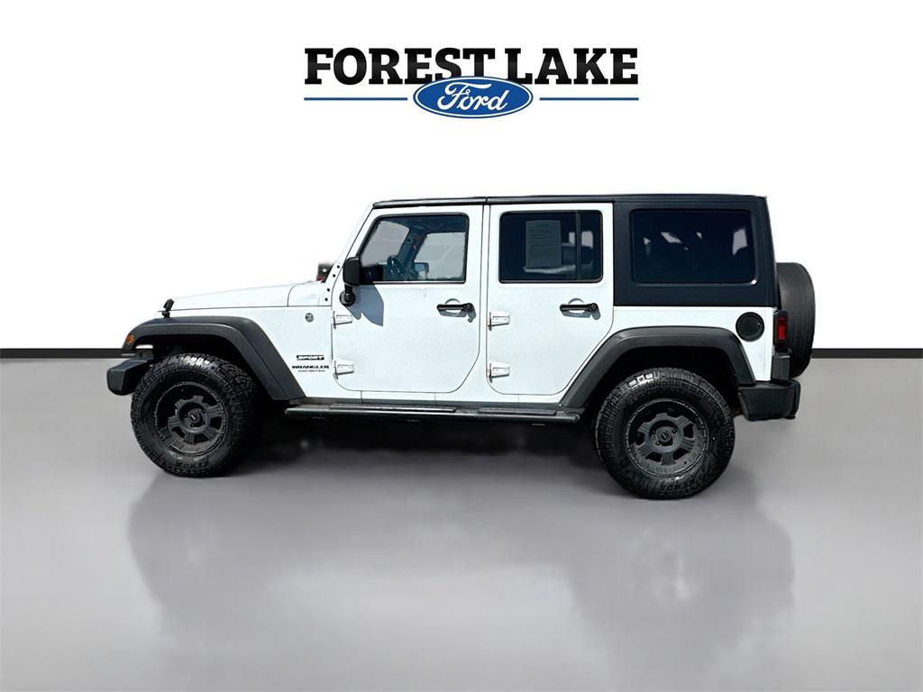 used 2015 Jeep Wrangler Unlimited car, priced at $15,899