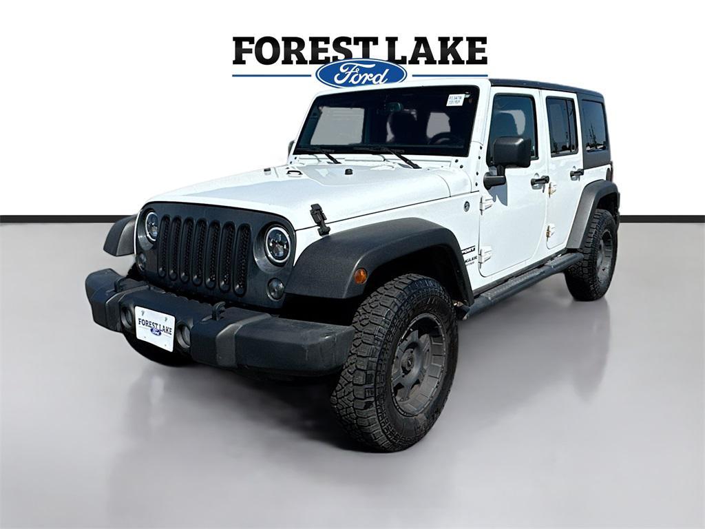 used 2015 Jeep Wrangler Unlimited car, priced at $15,899