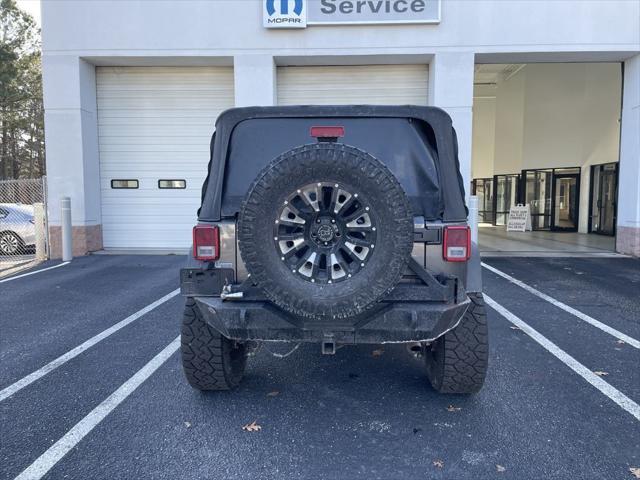 used 2018 Jeep Wrangler JK car, priced at $23,900