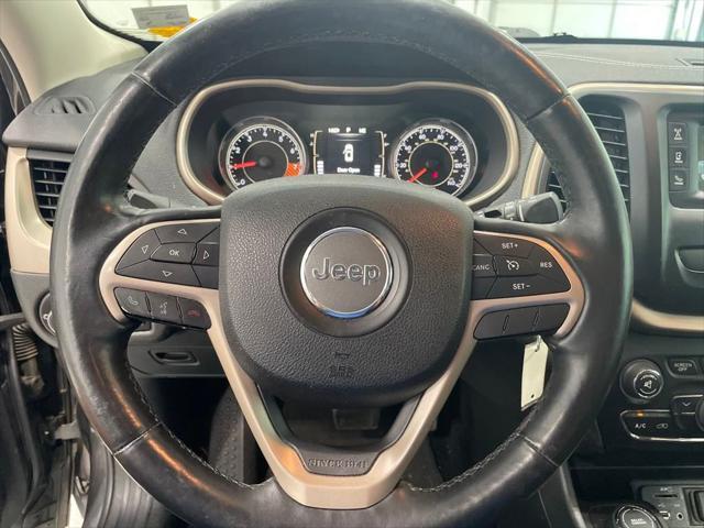 used 2014 Jeep Cherokee car, priced at $13,880