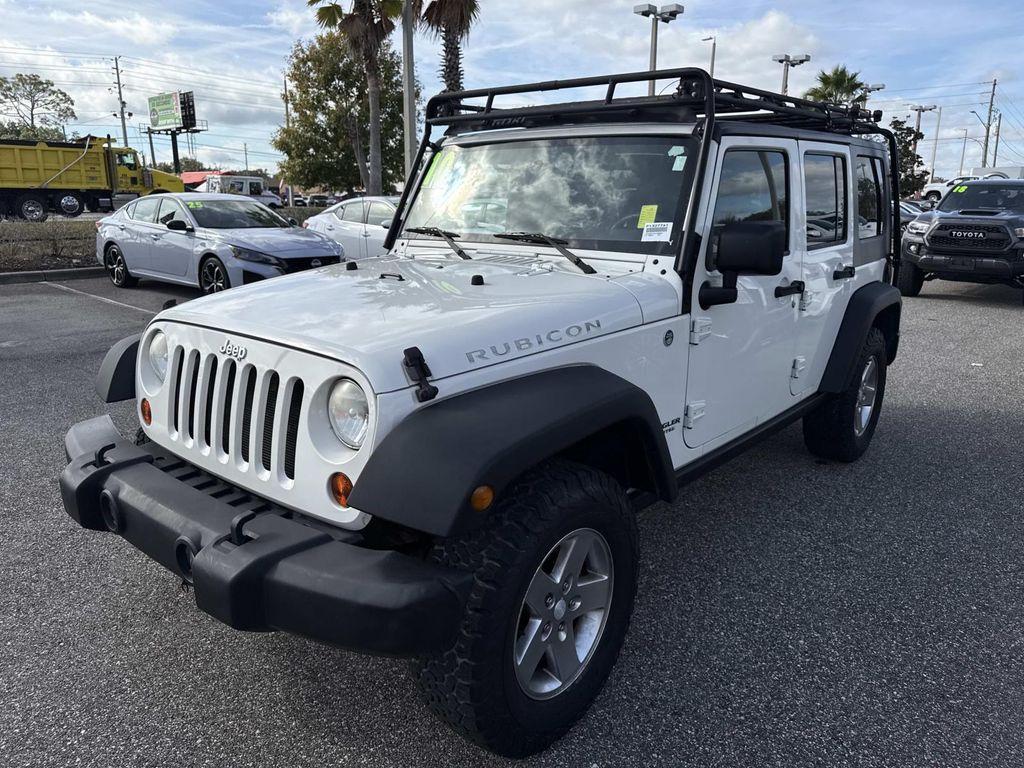 used 2010 Jeep Wrangler Unlimited car, priced at $12,995