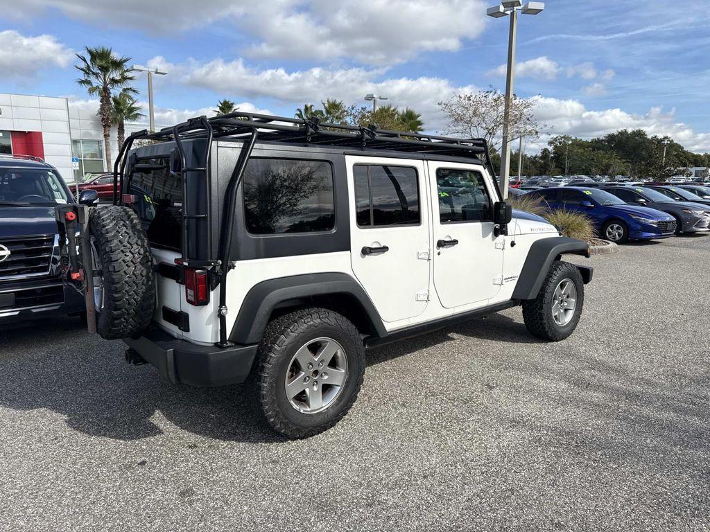 used 2010 Jeep Wrangler Unlimited car, priced at $12,995