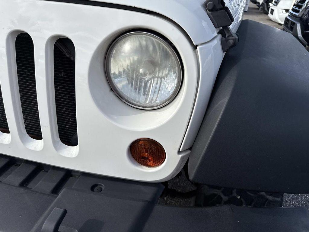 used 2010 Jeep Wrangler Unlimited car, priced at $12,995