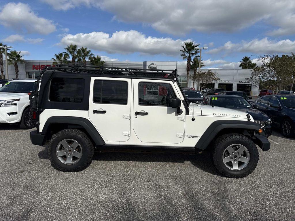used 2010 Jeep Wrangler Unlimited car, priced at $12,995