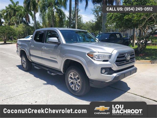 used 2018 Toyota Tacoma car, priced at $19,697