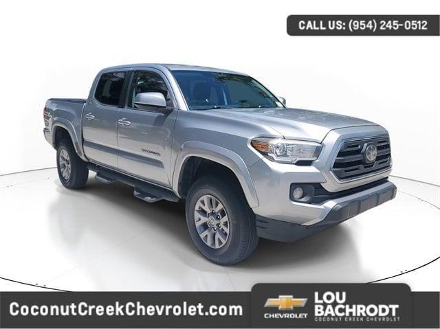used 2018 Toyota Tacoma car, priced at $19,697