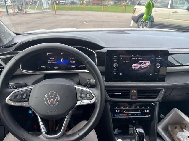 used 2025 Volkswagen Taos car, priced at $31,995