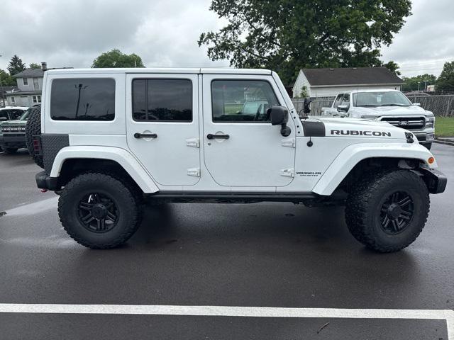 used 2015 Jeep Wrangler Unlimited car, priced at $21,843