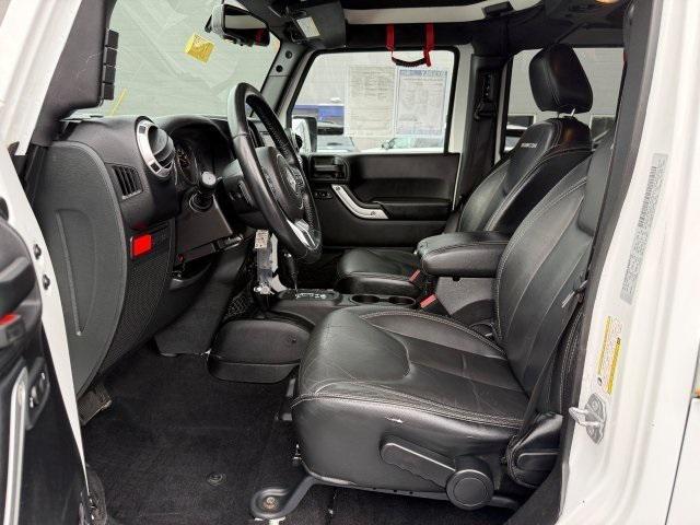 used 2015 Jeep Wrangler Unlimited car, priced at $21,937