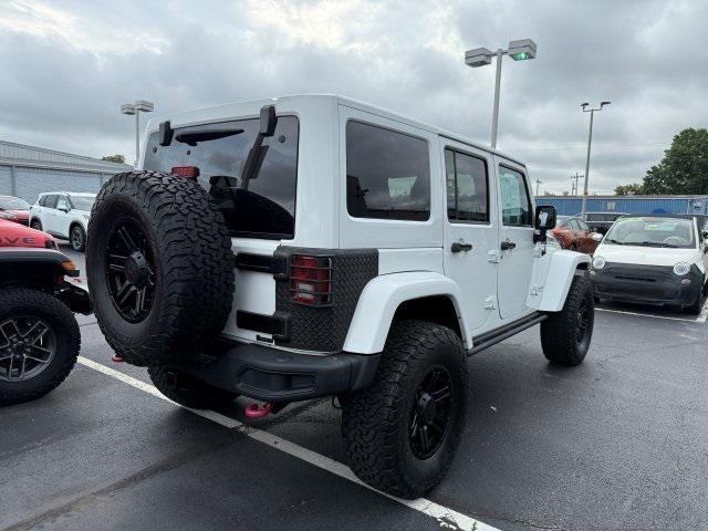 used 2015 Jeep Wrangler Unlimited car, priced at $21,937