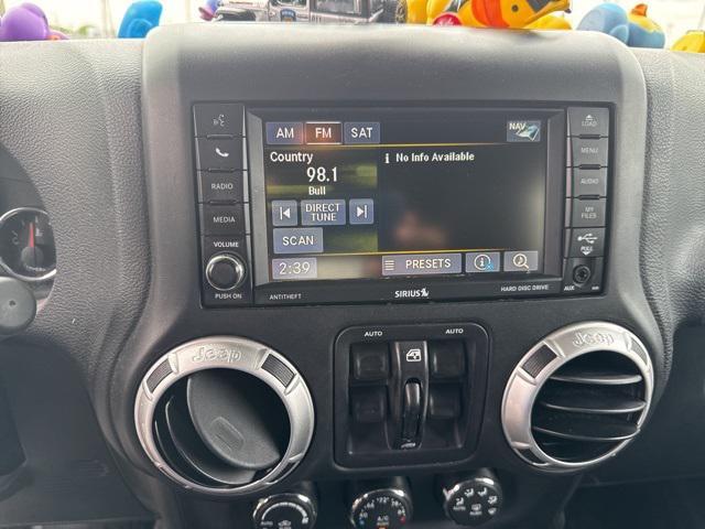 used 2015 Jeep Wrangler Unlimited car, priced at $21,843
